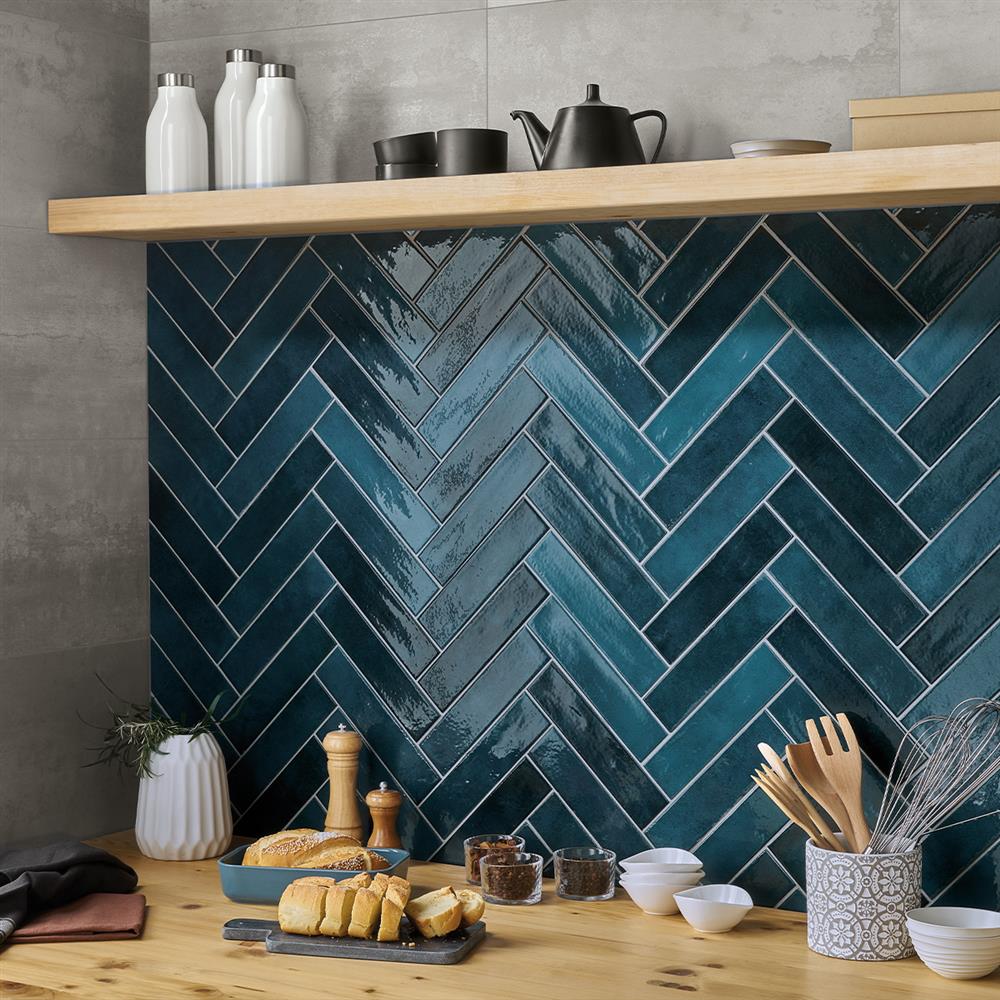 Valencia azure blue metro splashback tiles in a herringbone pattern